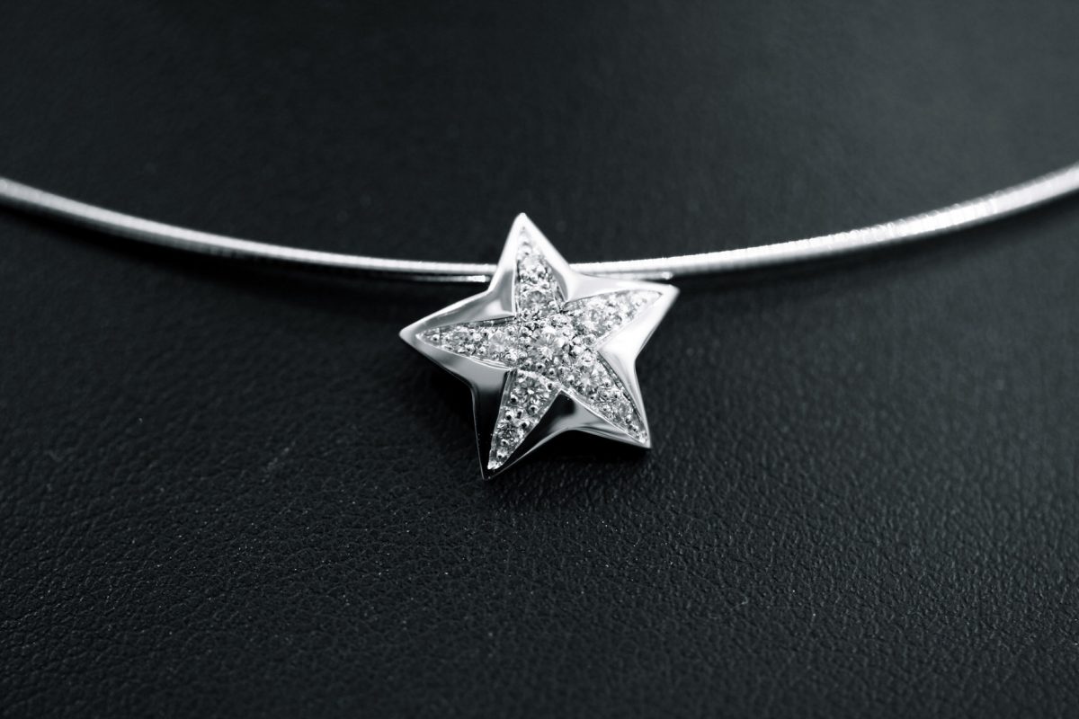 Pendentif "Stars". Or gris, diamants
